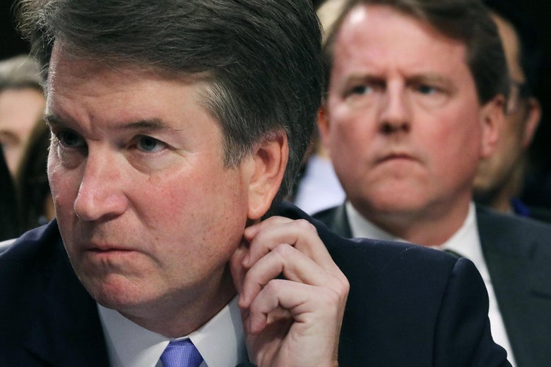 Supreme Court nominee Judge Brett Kavanaugh (L) testifies during the third day of his confirmation hearing before the Senate Judiciary Committee as White House Counsel Don McGahn listens on Capitol Hill September 6, 2018 in Washington, D.C.